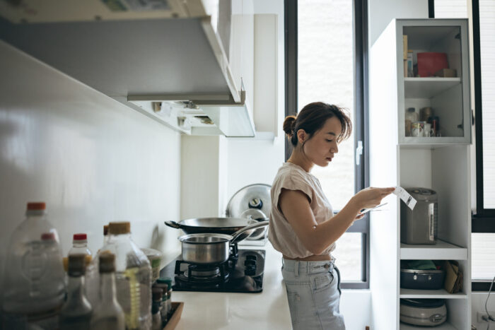 woman examining what is cpi consumer price index and how it impacts property market