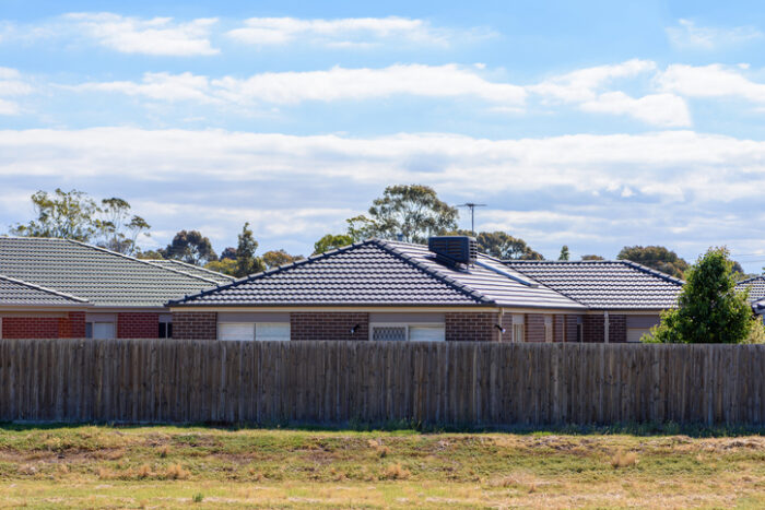 Melbourne, Australia - Dec 10, 2016: Empty land next to recently built townhouse in Melbourne.