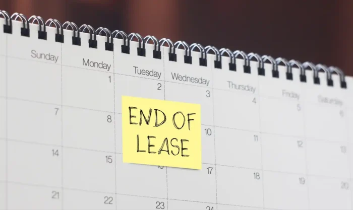 Calendar with post it note reading 'END OF LEASE'